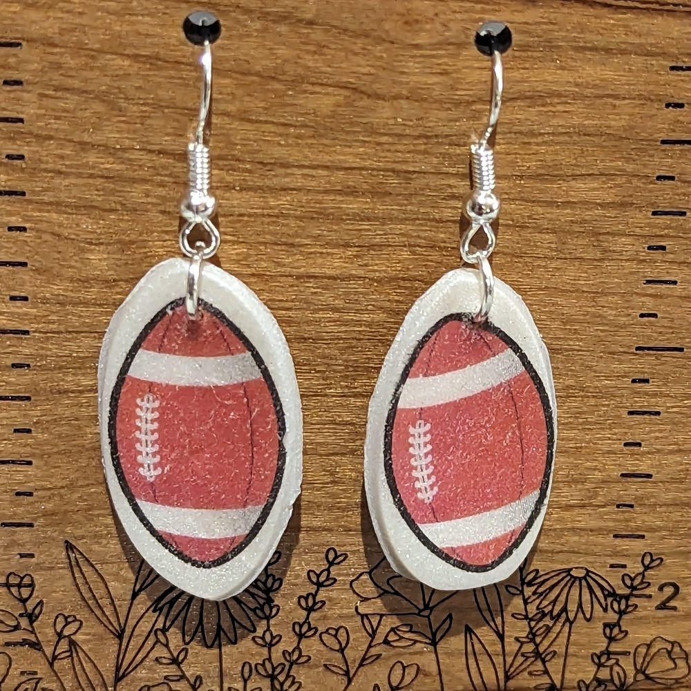3 for $6 Item: Clay Football Dangly Earrings NEW!